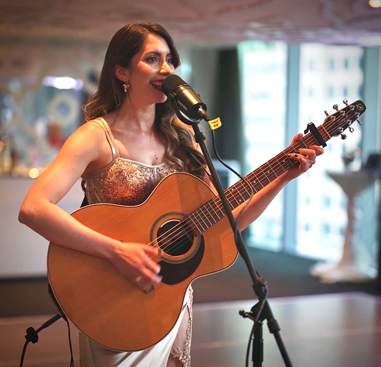 Jessica, vocalist and guitarist, performing live